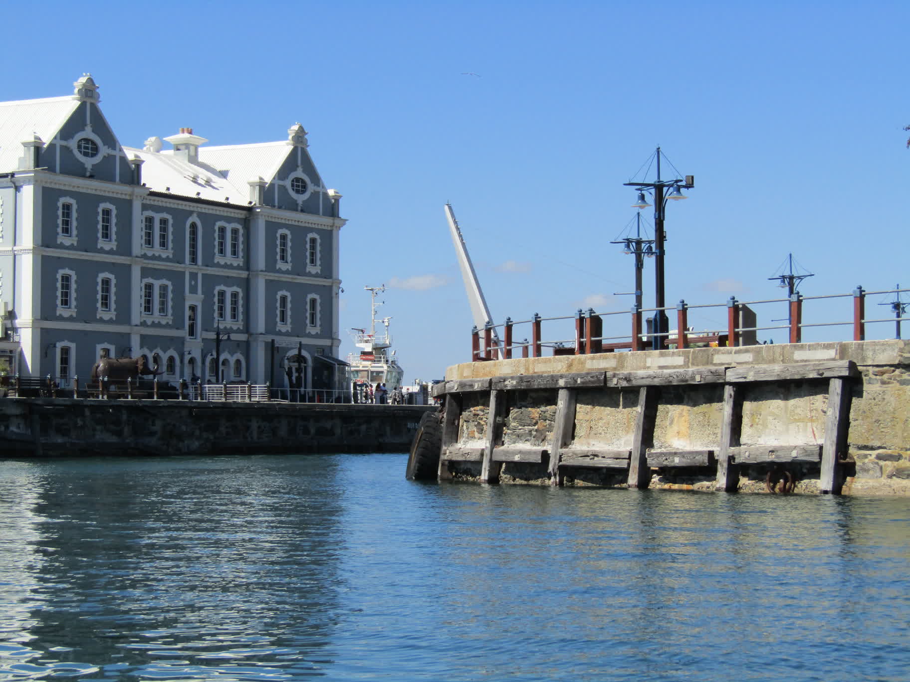 Old Port Captain's Building and channel connecting East Quay to the larger harbor