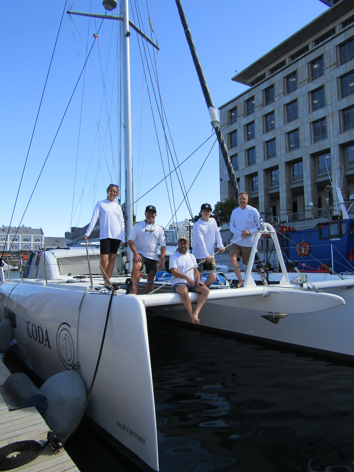 The crew of SV Coda, minutes prior to departing Cape Town, South Africa. From left to right: Brianna, Wes, Dan, Auden and Justin.