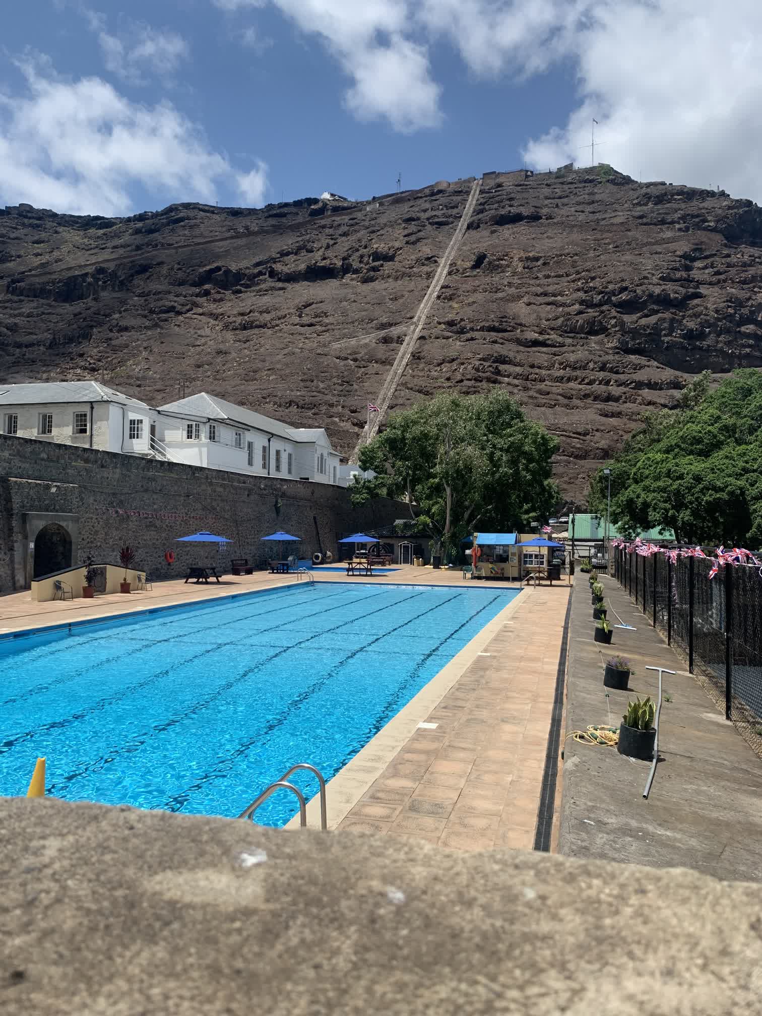 The community swimming pool with Jacob's Ladder (and its 699 steps) in the background