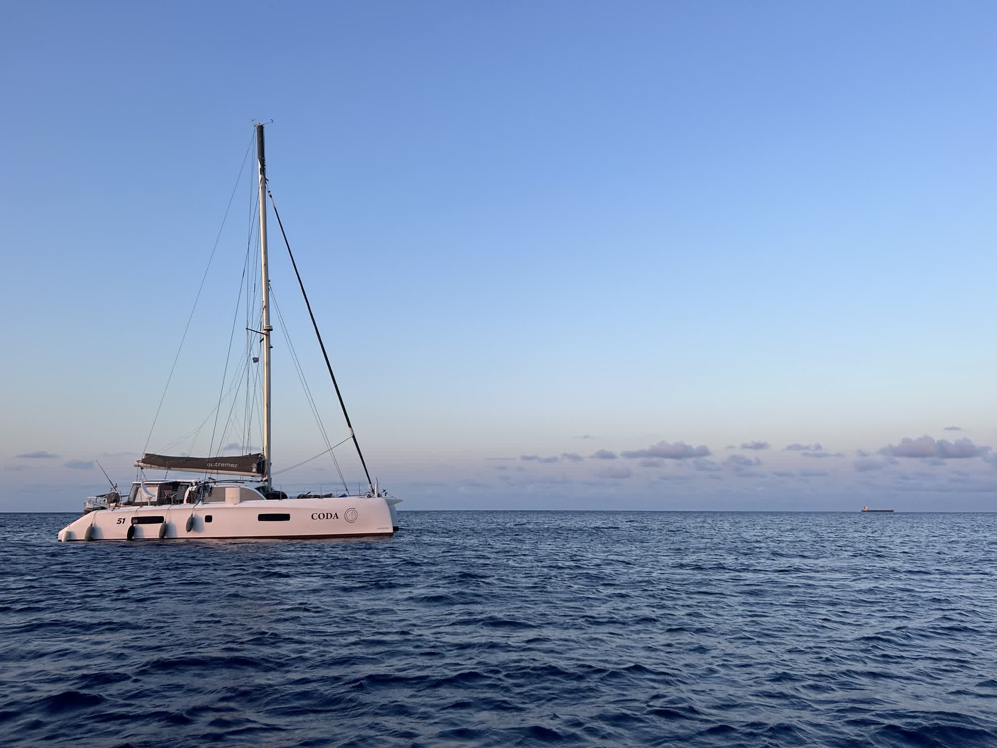 Coda at anchor in the evening light. Photo courtesy of Brianna