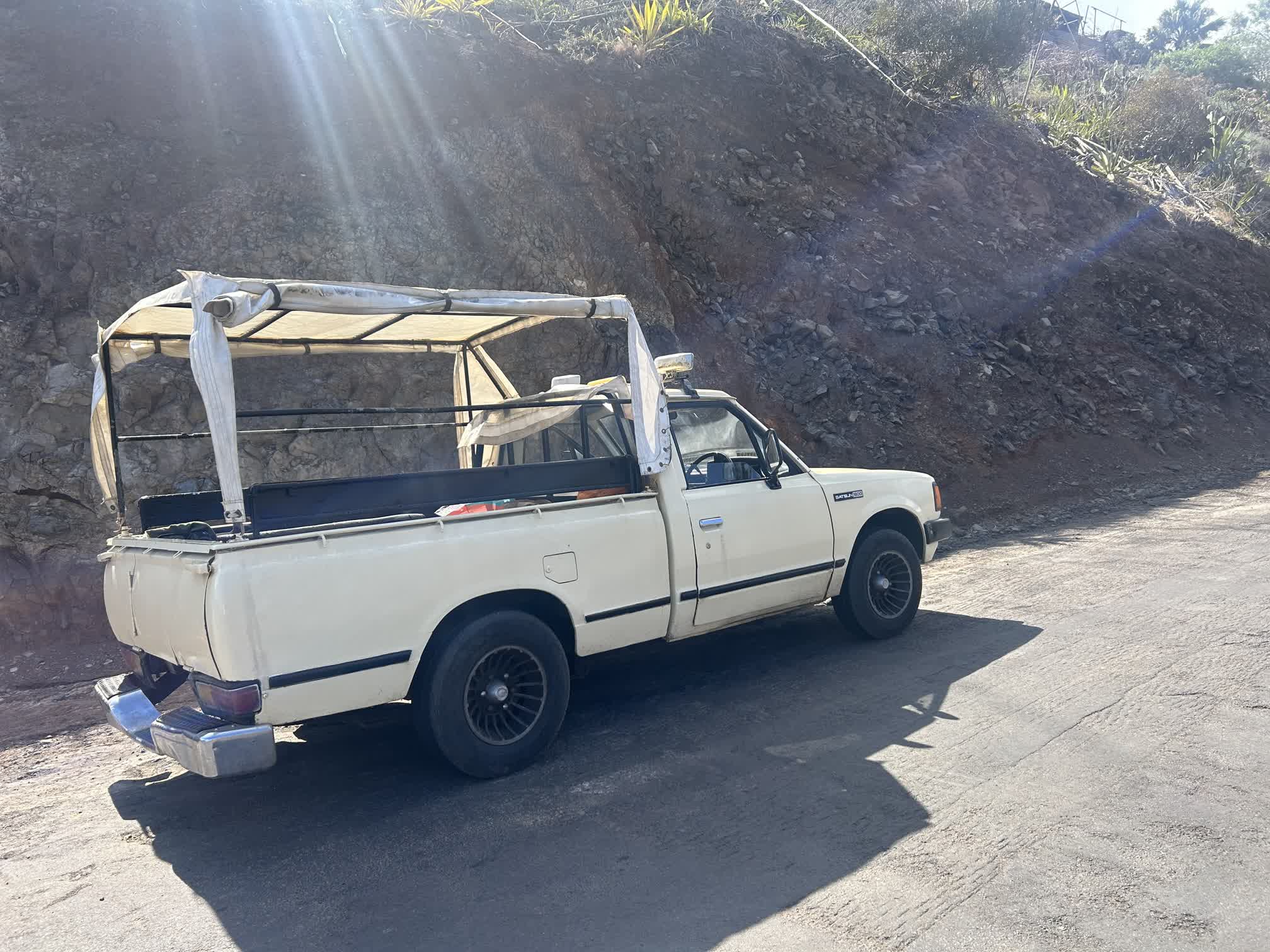 Robert's 1980 Datsun 1800. Four of us rode in the back and we'd each take turns riding shotgun with Robert in the front. Photo courtesy of Brianna