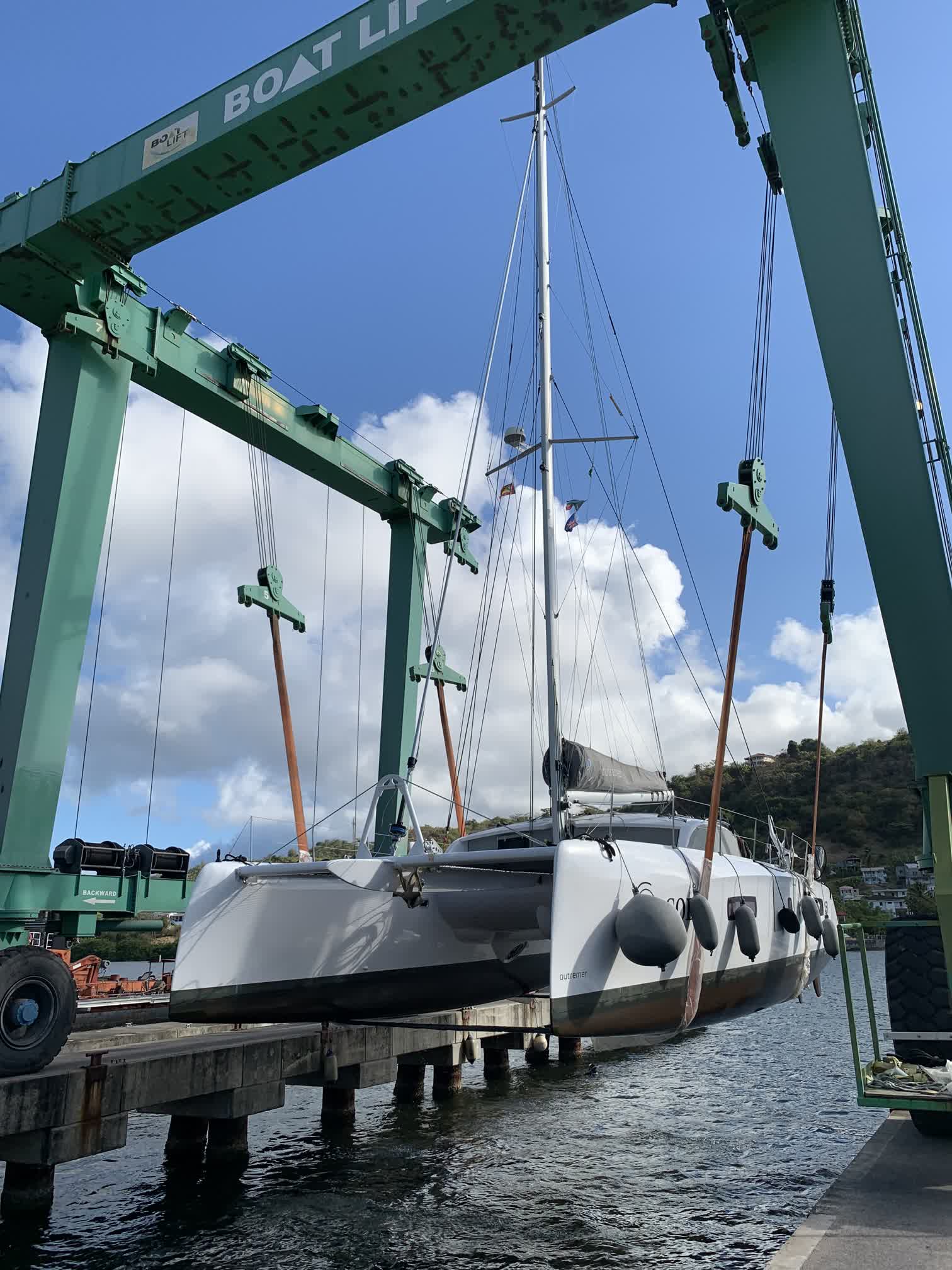 <i>Coda</i> finally wrangled into the boat lift